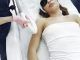 beautician conducting laser hair removal treatment